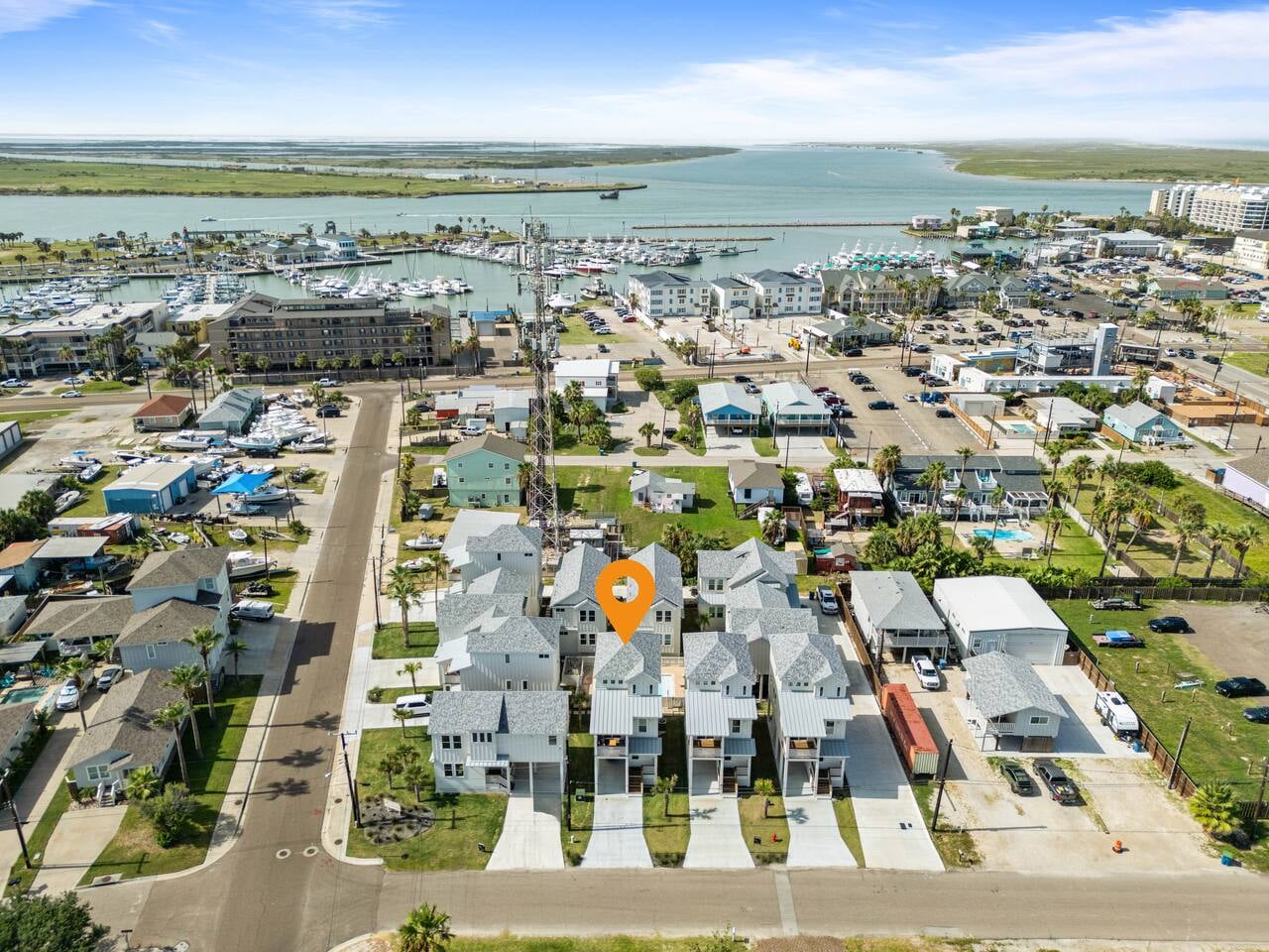 Right in the heart of downtown Port A, steps from the marina, restaurants, and fun. You can’t get closer!